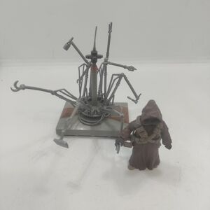 Hasbro Action Figure with Brown Cloak and Gray Base